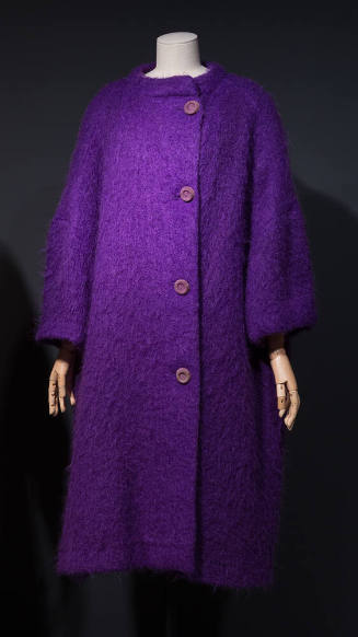 Purple knee-length barrel coat with wide sleeves and large left-of-center buttons
