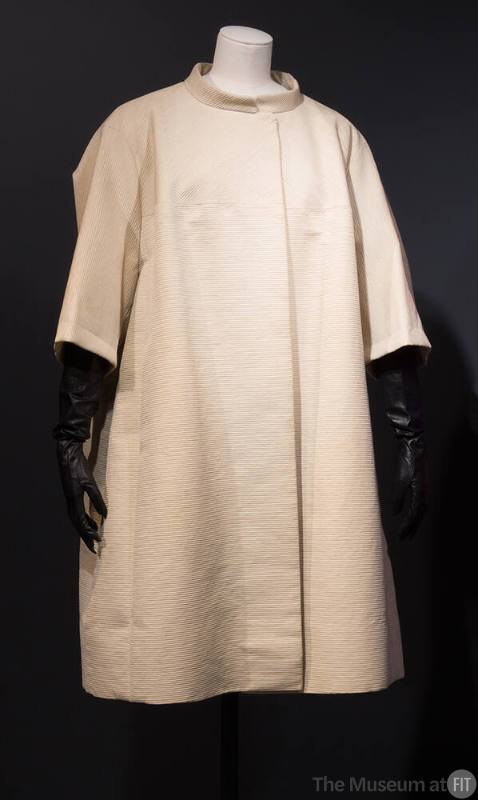 Full square cut coat in pale green cord