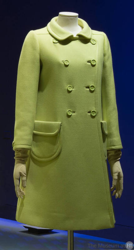 Yellow green double breasted short coat, two rounded flap pockets and round neckline