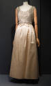 Off white sleevless gown with white net bodice embellished with silver thread embroidered cricl…