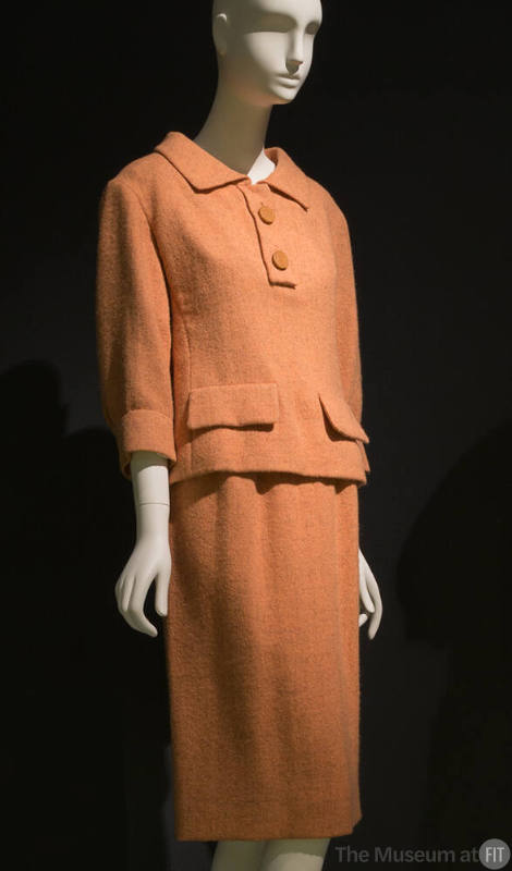 Orange wool 3/4 top with collar and front flap pocket and matching skirt