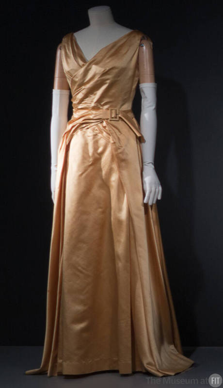 Pale gold sleeveless evening gown, v-neck front and drapoed front panel