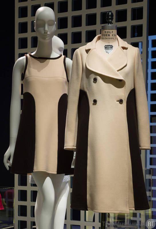 Left: beige sleeveless mini dress with black trim and side panels Right: matching beige double-…