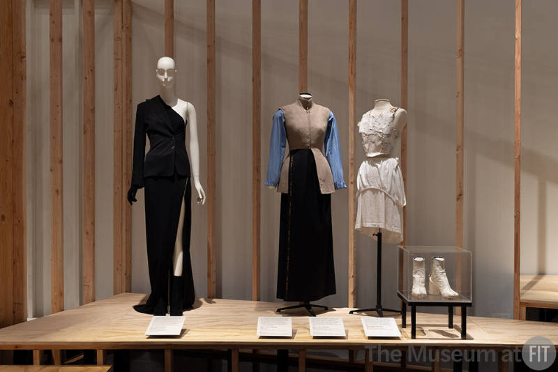 A detail of the Deconstruction and the Avant-Garde section. From left to right: black ensemble by Ann Demeulemeester, all other garments and boots by Maison Martin Margiela. 