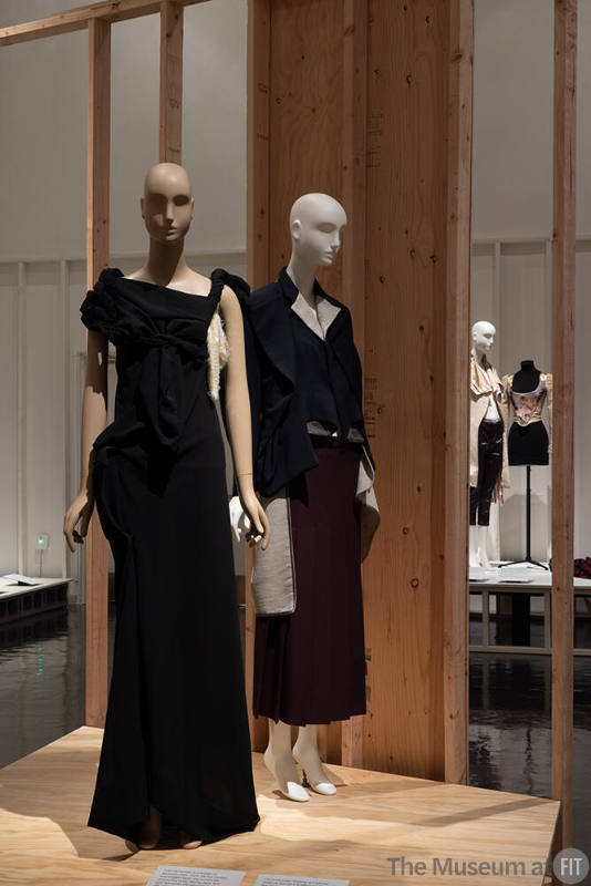 A detail of the Deconstruction and the Avant-garde section, featuring garments by Yohji Yamamoto (left) and Comme des Garçons. 