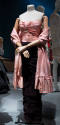 Evening dress of pink and white horizontal striped strapless bodice with matching stole and bla…