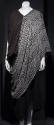 Black short sleeve top with white net poncho style overlay