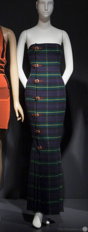 Blue, green, yellow, black wool plaid strapless floor length kilt dress with brown suede buckle…