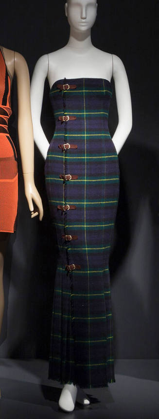 Blue, green, yellow, black wool plaid strapless floor length kilt dress with brown suede buckle…