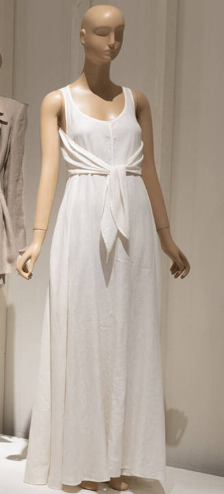 White linen floor length halter dress with back bodice panel extending to self ties