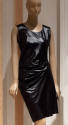 Black sleeveless knee length shift dress with folded band at right hip