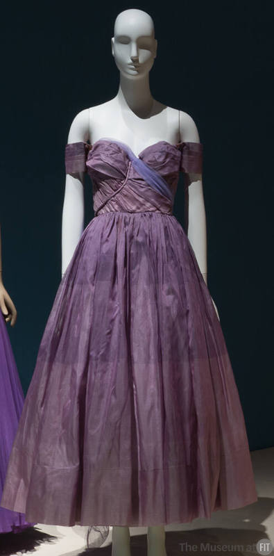 Multi-shade purple long evening dress with wide horizontal stripes; asymmetrically draped strap…