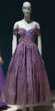 Multi-shade purple long evening dress with wide horizontal stripes; asymmetrically draped strap…