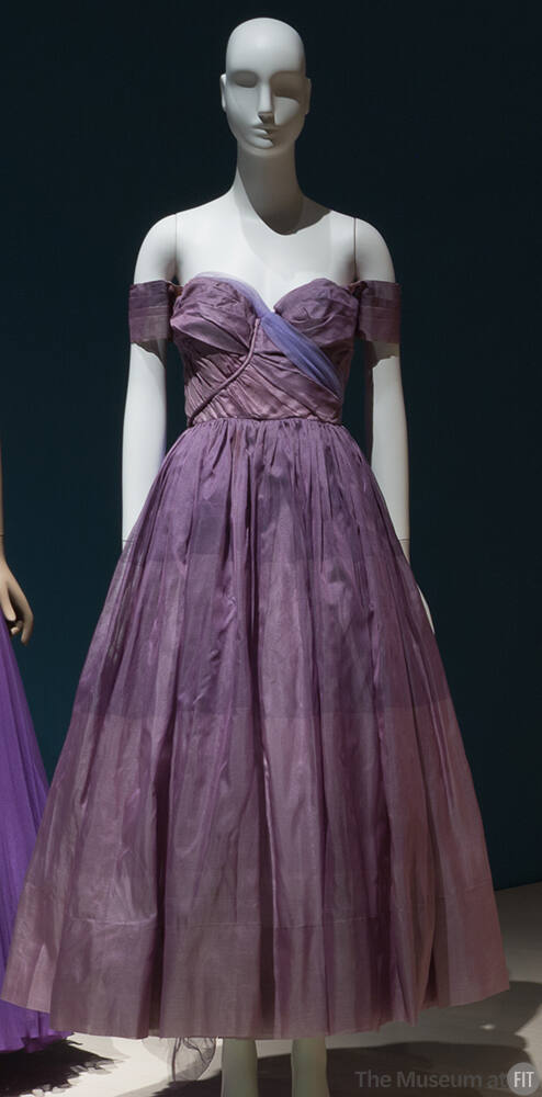 Multi-shade purple long evening dress with wide horizontal stripes; asymmetrically draped strap…