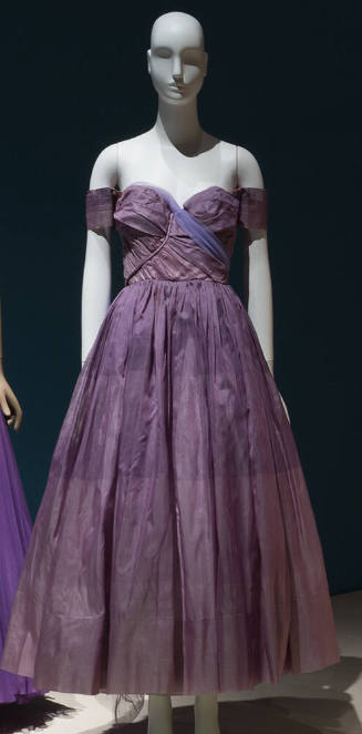 Multi-shade purple long evening dress with wide horizontal stripes; asymmetrically draped strap…