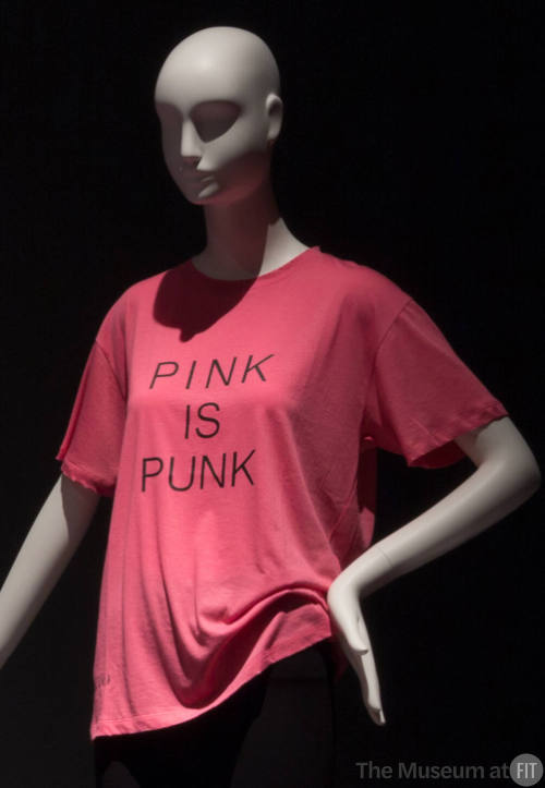 Pink short sleeve t-shirt with black text reading “Pink is Punk” at center front