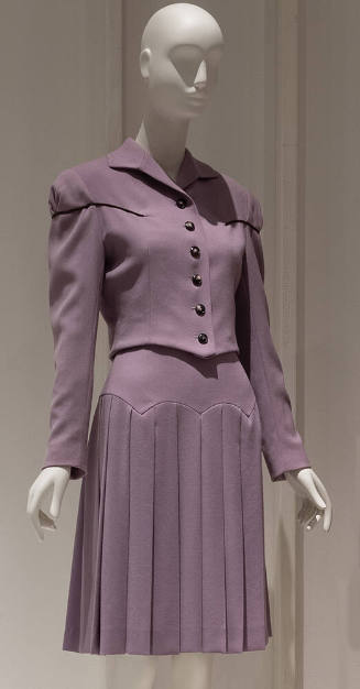 Purple long sleeve button front jacket, purple to-the-knee pleated skirt