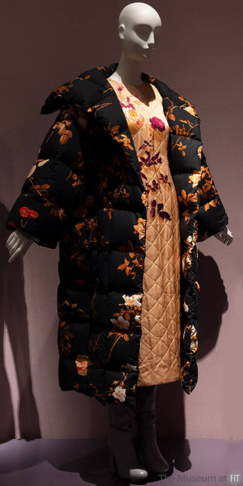 Off-white quilted dress with bodice floral design and black long sleeve puffer coat with scatte…