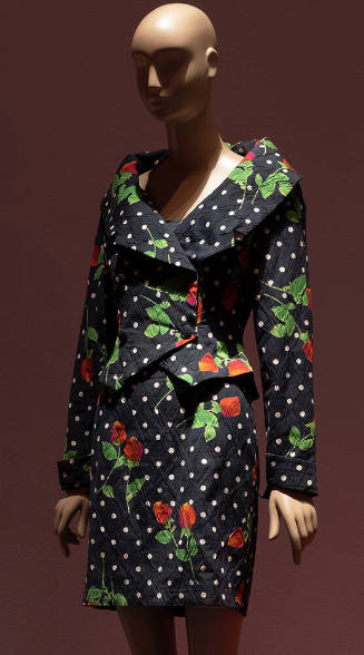 Dark blue long sleeve jacket and dress with orange, pink and yellow roses with green leaves and…