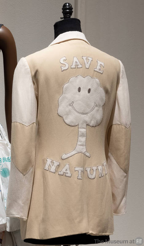 Beige long sleeve jacket with Save Nature smiling tree applique center back, heart elbow patche…