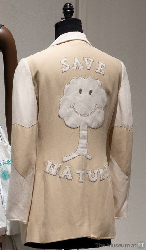 Beige long sleeve jacket with Save Nature smiling tree applique center back, heart elbow patche…
