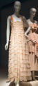 Alternate view of pink evening dress in dimly lit exhibition 