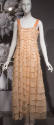 Floor length evening dress of pink overlapping semi-circles with pink camisole shoulder straps