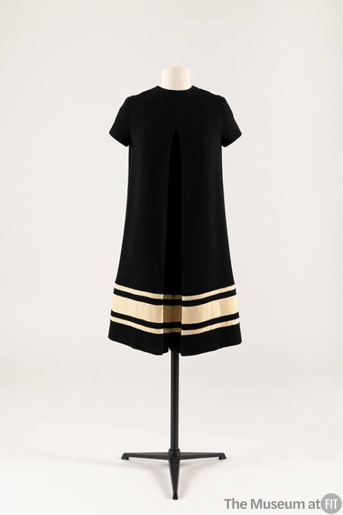 Black a-line culotte dress with three white bands at hem