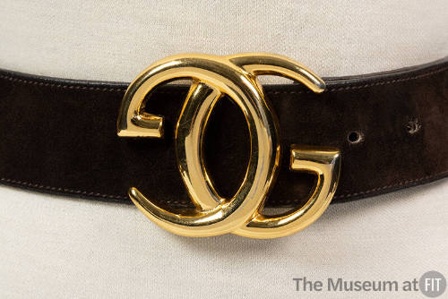 Dark brown belt with gold metal interlocking double G Gucci logo buckle