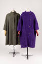 Gray coat and purple coat with large front buttons of a similar wide cut 