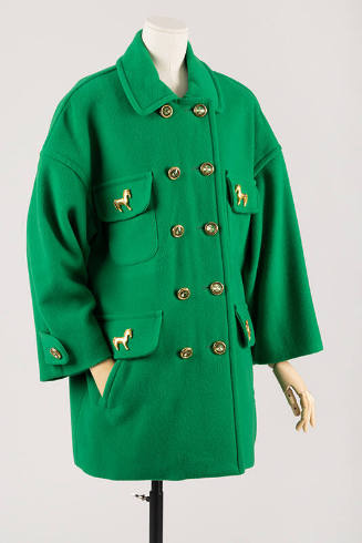 Bright green double-breasted jacket with gold metal buttons and gold horse pins on four pocket …