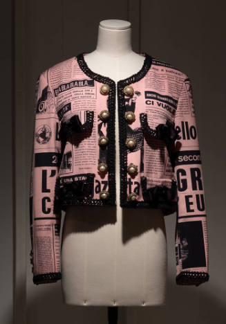 Pink and black cropped long sleeve jacket with newspaper print design and 10 pearl buttons