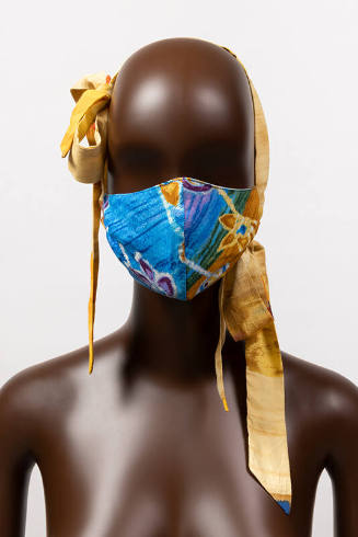 Blue floral design face mask with long dyed yellow side bow ties