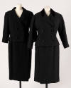 Black double breasted suit with ¾ sleeves and matching straight skirt with grey and black doubl…