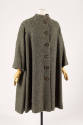Oversize grey/green swing coat with short stand collar and front button closure