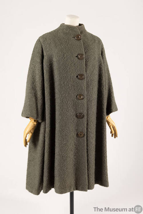 Oversize grey/green swing coat with short stand collar and front button closure