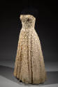 Strapless pale pink floor-length gown with allover floral and scroll beading