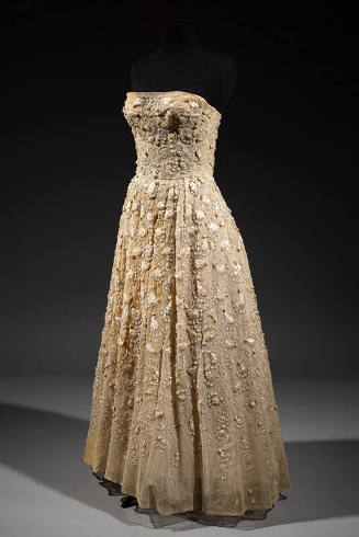 Strapless pale pink floor-length gown with allover floral and scroll beading