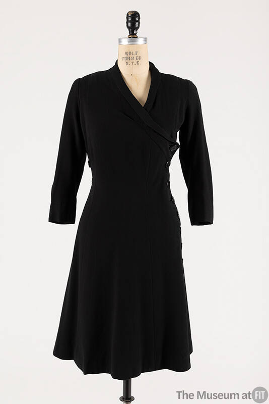 Black wool 3/4 sleeve to-the-knee length coat dress with crossover front with side button closu…