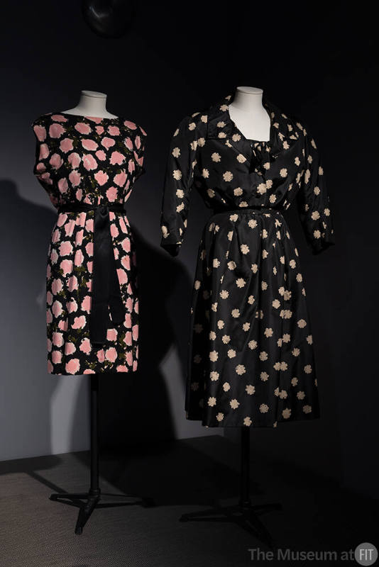 Dior + Balenciaga, Left to right 86.106.4 (black and pink dress), PL74.1.3 (black and beige ensemble)
