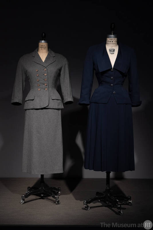 Dior + Balenciaga, Left to right: PL74.1.32 (grey suit), 2017.8.7 (blue wool suit)
