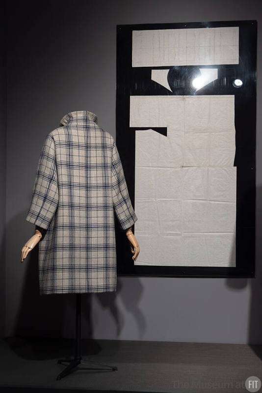 Dior + Balenciaga, 78.75.1 (plaid coat and pattern on wall)