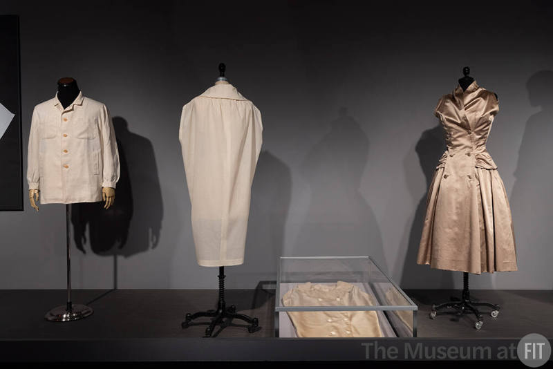 Dior + Balenciaga, Left to right: 89.155.1 (man's jacket), muslin copy and 77.27.2 (dress in case), 71.213.20 (beige satin dress)
