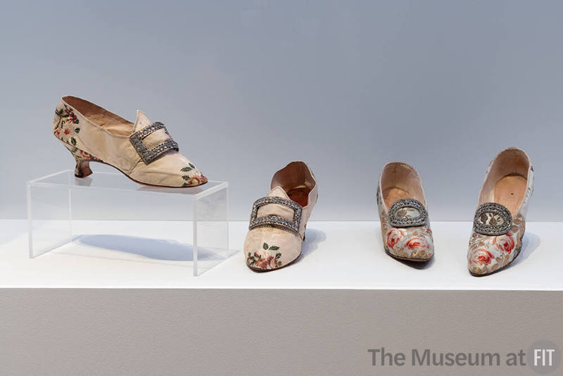 A pairing of 18th-century and early 20th-century shoes from the Identity: Historical Inspirations section. 