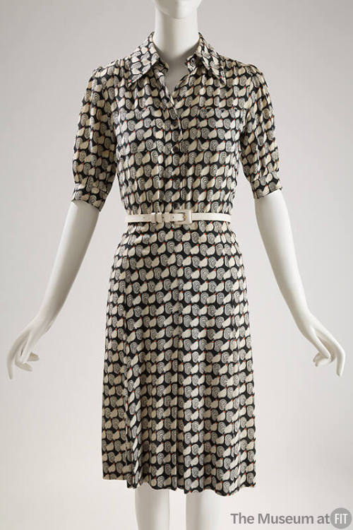 Allover stylized rooster print rayon dress with 3/4 sleeves, button front, narrow white belt