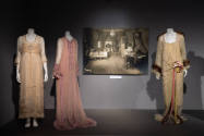 Designing Women exhibition installation view of three mannequins in two peignoirs and a tea gow…