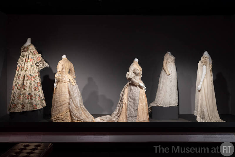 Designing Women_10 Left to Right: Robe à la Française, France, 1760-1775 (2017.2.1); Madame Hardy, Afternoon Dress, Paris, circa 1877 (83.16.10); M. A. O’Connell, Day Dress, Newburgh, New York, circa 1887 (P87.20.38); Round Gown of “Silver Muslin”, Possibly New York State, 1795-1800 (2018.16.1); Nightgown, New York, 1907 (82.91.1)