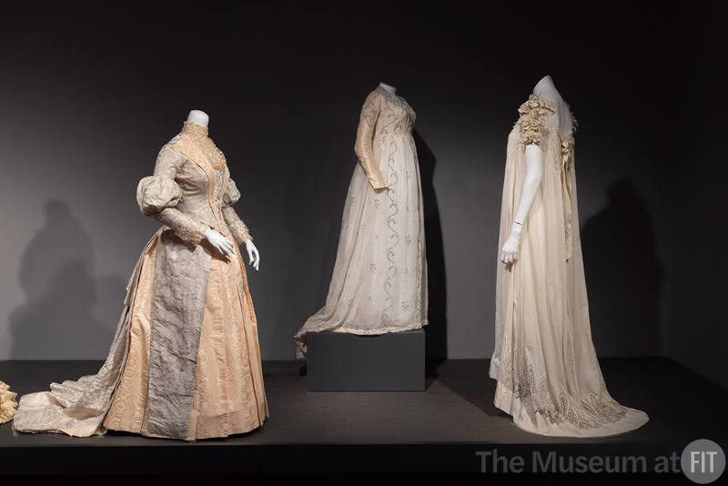 Designing Women_12 Left to Right: M. A. O’Connell, Day Dress, Newburgh, New York, circa 1887 (P87.20.38); Round Gown of “Silver Muslin”, Possibly New York State, 1795-1800 (2018.16.1); Nightgown, New York, 1907 (82.91.1)