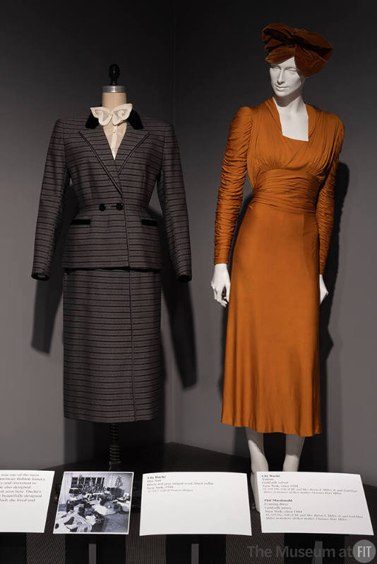 Designing Women_20 Lily Daché Day Suit, New York, 1948 (74.110.1); Turban (with dress by Phil MacDonald) New York, circa 1944 (95.103.28)