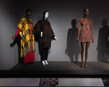 Designing Women exhibition installation view of three mannequins in a yellow and black plaid po…